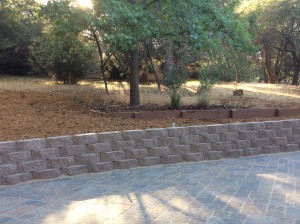 Wall blocks and pavers extend your living space and eliminate bare dirt and grass